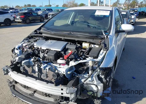 2021 Toyota Prius Prime Le from USA, damaged, VIN JTDKAMFP1M3177534